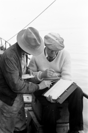Erik Gustaf Moberg (writing) and Martin Wiggo Johnson on board R/V Scripps