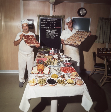 [Cooks with food and menu on Glomar Challenger, c1973]
