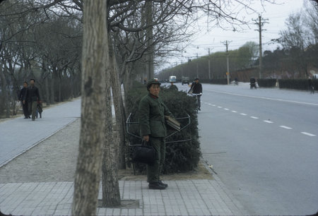 A Soldier Waiting for a Bus- Beijing