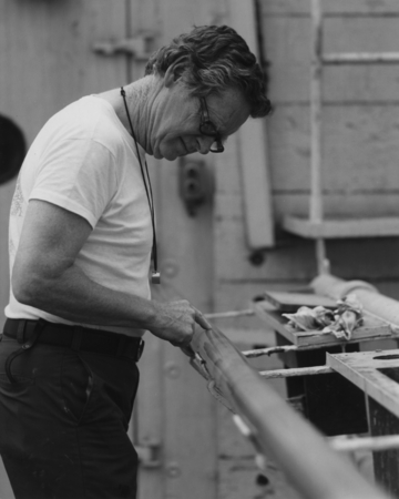 Scripps Institution of Oceanography scientist Edward L. Winterer, aboard the D/V Glomar Challenger (ship) inspecting a cor...