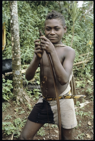 Young man with palmwood bow.