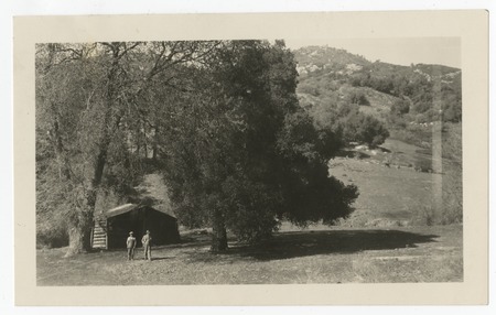 Men by cabin at Cuyamaca