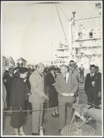 Claude M. Adams showing General Matthew Ridgeway and Mrs. Ridgeway around a Japanese whaling ship. c1947