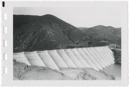 View of Lake Hodges Dam from the unfilled reservoir