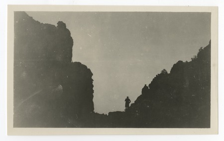 Silhouette of man in canyon, Arizona