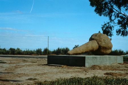 Signs of Mount Signal: View of large sand spike model on a concrete pedestal