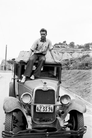 Robert Sinclair Dietz, posing on car at Scripps Institution of Oceanography