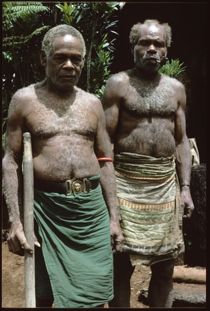 Suufiomea of &#39;Ubuni with old police belt, left, and Safaasafi, right.