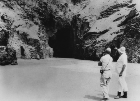 Cave in the North of Playa Santa Rosa, January 17, 1958. Robert M. Norris and Jorge Broggi (Peruvian IGY scientific chief)...