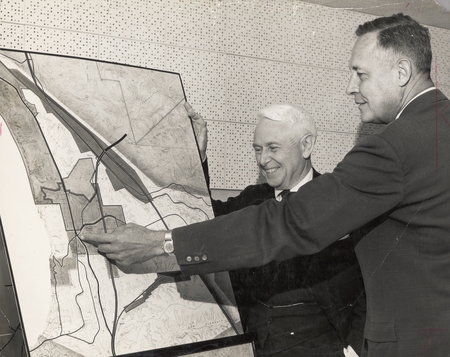 University of California Regent Donald H. McLaughlin and Roger Revelle examine map of proposed site of University of Calif...