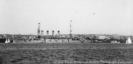 U.S. Navy ship and small boats on San Diego harbor