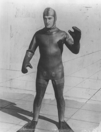 John S. Foster modeling wet suit designed by Hugh Bradner