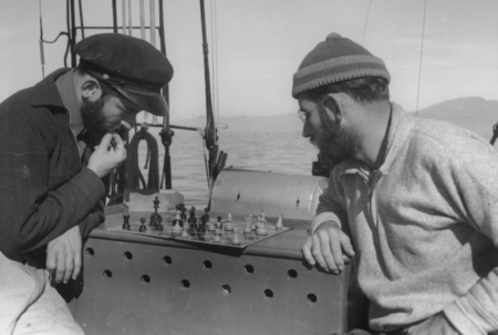 [Two men play chess aboard R/V E.W. Scripps]