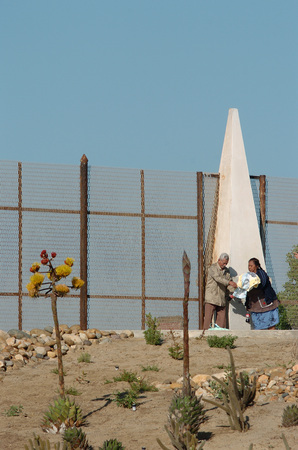 La esquina/ Jardines de Playas de Tijuana: border fence with marker and new plantings