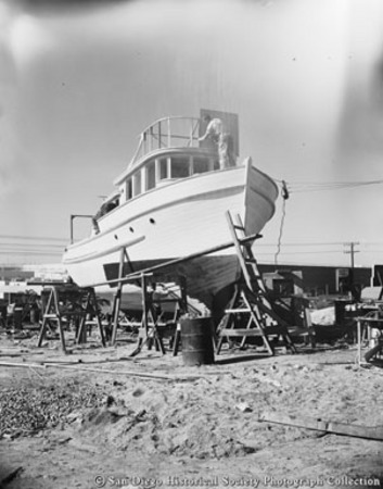 Man working on boat in drydock at Chaffee Machine Company