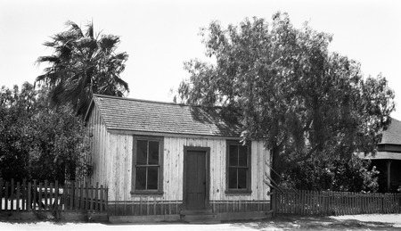 House #66-4 in Ensenada, small house, medium condition, board and batten whitewash