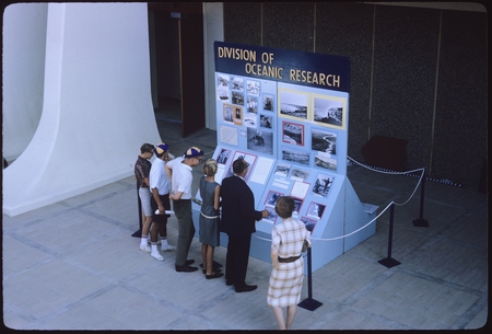 Parents and students observing a display from the Division of Oceanic Research
