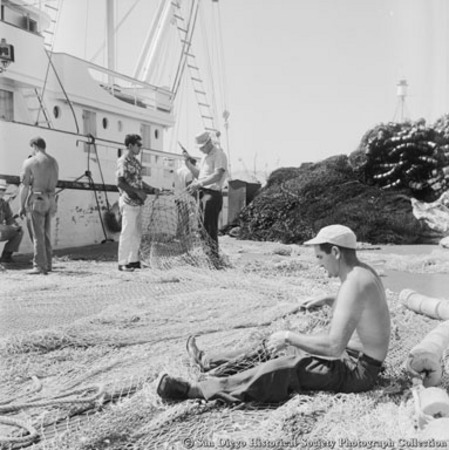 Repairing fishing nets on Embarcadero