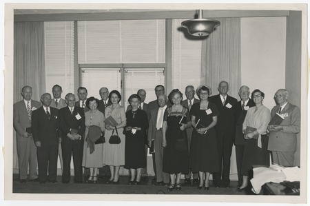 Group portrait in office interior