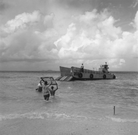 Loading landing craft from beach