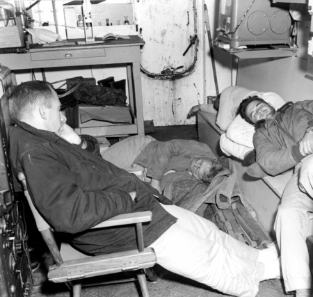 Harris B. Stewart, John D. Isaacs and Jose Barandian napping on the Northern Holiday Expedition