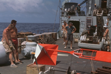 Members of Swan Song Expedition (1961) crew are shown here assembling the tower for the taunt wire buoy launching, oceanog...