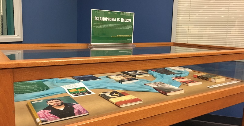 display case with library books in it related to islamophobia