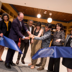 A photo of UC San Diego's leadership cutting the ribbon at the Geisel Library Renovation Reveal.