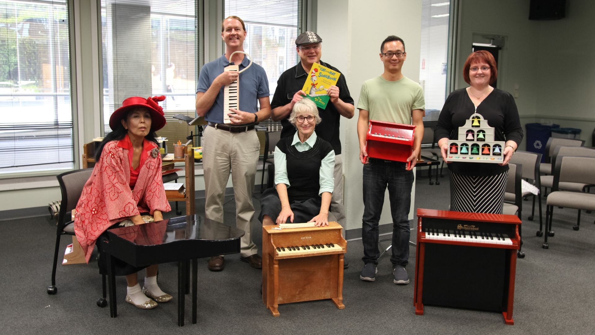 Toy Piano Festival performers pose for a photo at the San Diego Central Library.